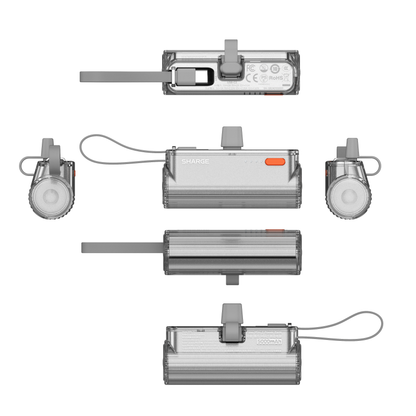 Silver SHARGE Flow Mini 2 power bank with swappable connectors and built-in USB-C for convenient pocket-sized fast charging.