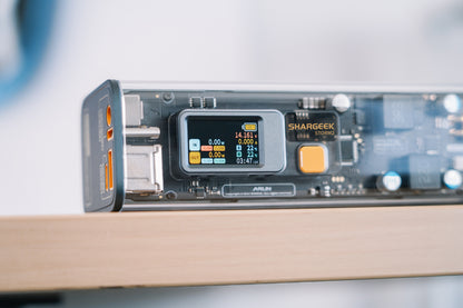 SHARGE Shargeek 100 Powerbank with transparent design and display, showcasing fast charging capability.