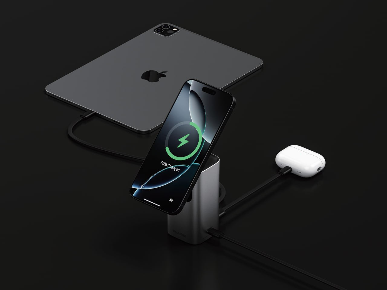 Smartphone with wireless charging pad and earbuds on a dark background