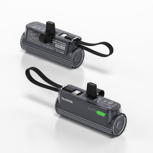 SHARGE Flow Mini 2 power bank with swappable connector, compact design, and built-in USB-C cable for convenient charging.