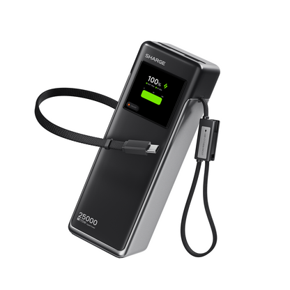 Black and silver power bank with digital display on a white background